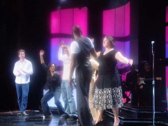 Nadya on stage with Wayne Brady and three others